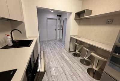 Apartament cu 3 camere semidecomandat, mobilat în P-ța Dorobanți - 12