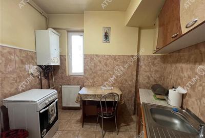 Garsoniera decomandata cu balcon si pivnita zona Turnisor Garsoniera decomandata cu balcon si pivnita zona Turnisor - 4