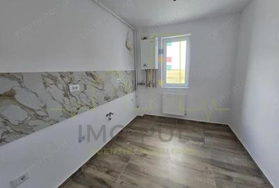 Apartament la parter cu balcon. Bucatarie separata. Loc de parcare - 3