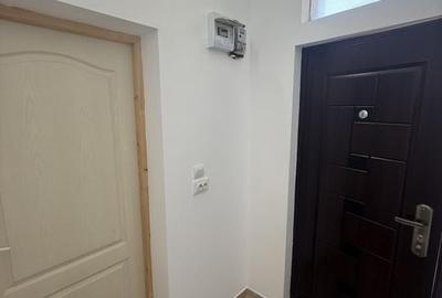 2 corpuri de Casă renovate + teren 125 mp Campina - 24