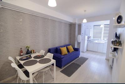 Apartament cu 2 camere semidecomandat, mobilat în Central