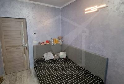 Apartament cu 4 camere semidecomandat, mobilat în Florești - 12