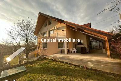 Casă cu 7 camere cu Teren 1200 Mp în Tomești