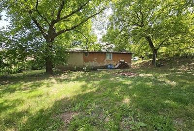 Casa spatioasa de vanzare in centrul satului Racaciuni  teren generos, livada, - 12