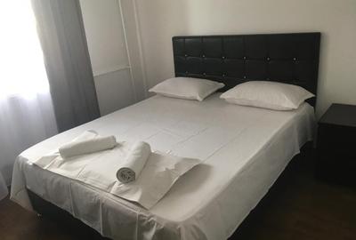 Apartament cu 4 camere decomandat, mobilat în P-ța Universității