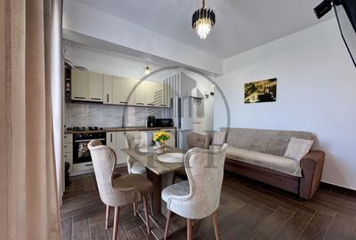Apartament cu 3 camere semidecomandat, mobilat în Sud