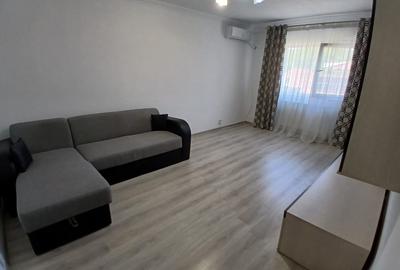 Apartament cu 2 camere semidecomandat, mobilat în Podul de Fier