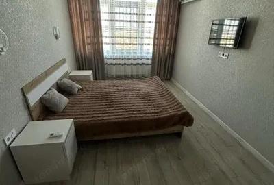 Garsonieră decomandată în Titan