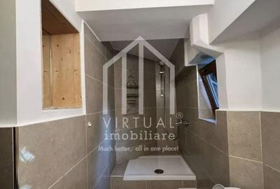 Casa formata din 2 apartamente, 2 garaje,  3 bai - zona Trei Stejari - 14