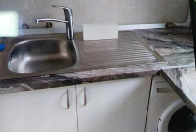 Garsonieră decomandată în Central - 7