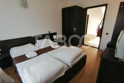 Pensiune 13 camere 16 bai sauna piscina si teren 1565 mp Cisnadioara - 32