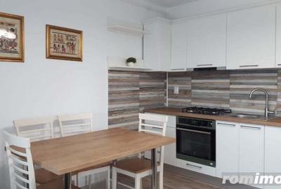 Garsonieră decomandată în Romană