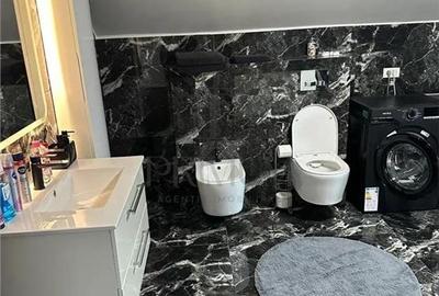 Casa individuala - teren 1000 mp - garaj - 17