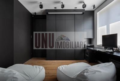 Apartament spatios cu zona de depozitare/dressing