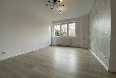 Apartament cu 3 camere semidecomandat în Giulești