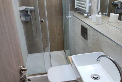 De vanzare apartament cu 3 camere 2 bai intrare Racadau - 7
