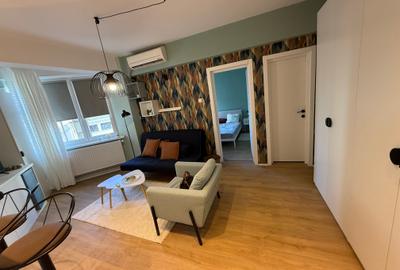 Apartament cu 2 camere semidecomandat, mobilat în P-ța Universității - 18