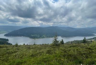 Vand sau schimb cu apartament ,teren in Belis langa lac