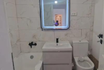 1 Decembrie 1918 metrou Ozana,bl.reabilitat 3/4 renovat, balcon ,totul nou. - 4