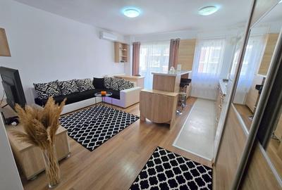 Apartament cu 2 camere semidecomandat, mobilat în Bună Ziua