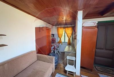 Teren intravilan 589 mp si cabana din caramida in Cuvin - 1