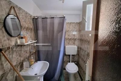 Casa cu 4 apartamente si curte proprie ,suprafata utila 122mp, zona semicentrala - 18