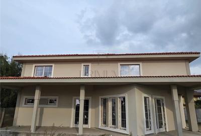 Casa individuala - teren 730 mp - garaj - 5 dormitoare - living 57 mp - 1