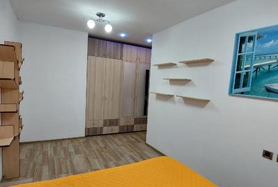 Apartament cu 3 camere decomandat în Tractorul - 2