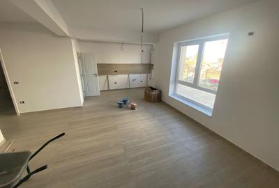 Nou.  62 mp utili. Gradina proprie 22 mp.. 3 parcari acoperite. Zona Braytim. - 4