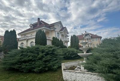 Casă cu 7 camere cu Teren 1200 Mp în Sânmartin