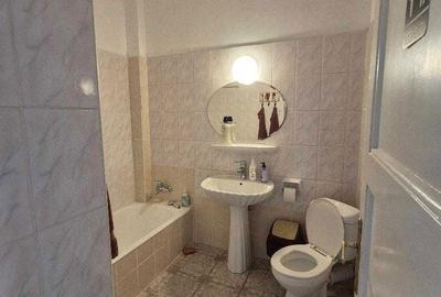 Apartament cu 4 camere decomandat în Central