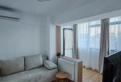 Inchiriez apartament de trei camere decomandat, modern, etaj 2 6, bloc nou, lift, parcare proprie