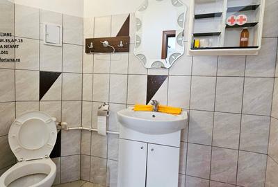 Locuinta individuala(apartament 4 camere)+spatiu comercial si teren ,Darmanesti - 21