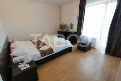 Pensiune 13 camere 16 bai sauna piscina si teren 1565 mp Cisnadioara - 14