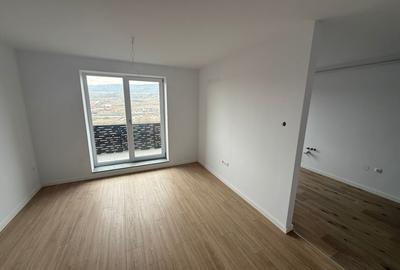 Apartament cu 2 camere decomandat în Chinteni - 2
