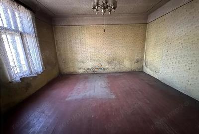 Casă cu Teren 980 Mp în Central