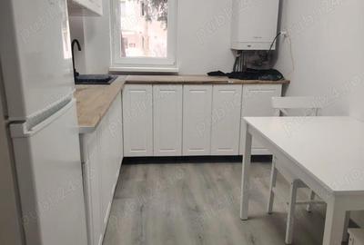 Apartament cu 2 camere semidecomandat, mobilat în Tractorul