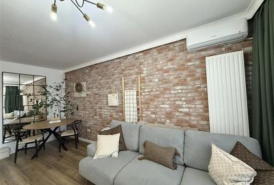 Apartament cu 2 camere decomandat, mobilat în Tractorul - 25