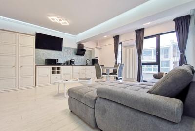 Apartament cu 2 camere semidecomandat, mobilat în Est