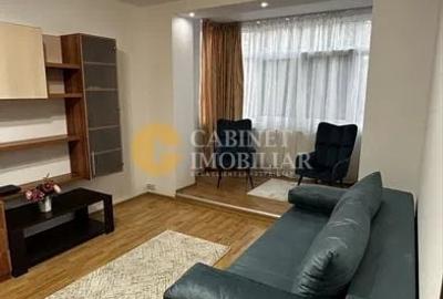 Apartament cu 2 camere semidecomandat, mobilat în Podu Roș