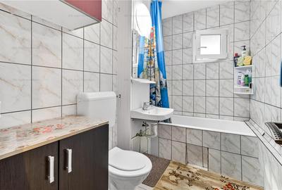 Apartament cu 3 camere decomandat în Tractorul - 7