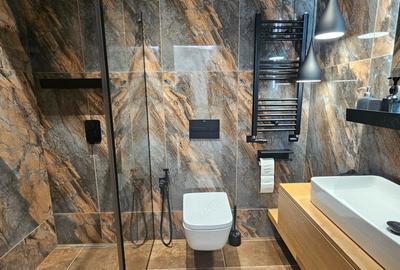 Apartament cu 2 camere decomandat în Tractorul - 1