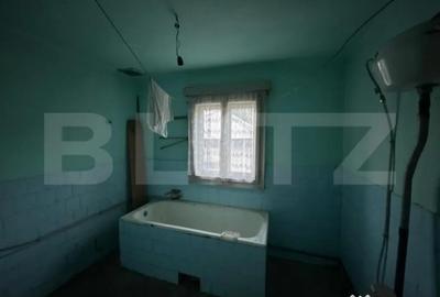 Casă cu 4 camere cu Teren 2000 Mp în Central