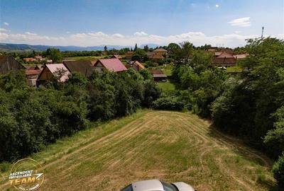 FILM! Teren intravilan 3.380 mp, in vecinatatea DN11,Santionlunca,Covasna - 2