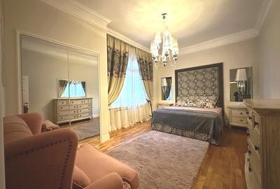 Apartament cu 5 camere semidecomandat, mobilat în Capitale - 11