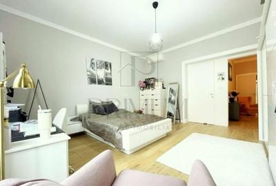 CENTRAL - ETAJ 1 - RENOVAT - 4 camere - 3 bai - centrala proprie - clima - GARAJ - 21