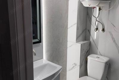Garsonieră decomandată în Central - 7