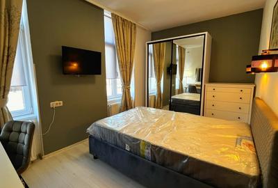 Apartament cu 3 camere decomandat, mobilat în Central - 11
