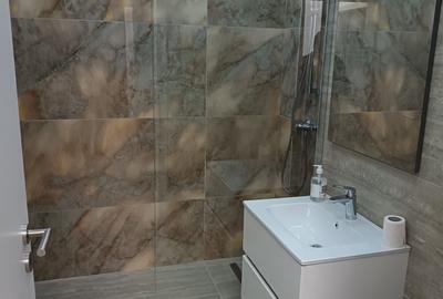 Apartament cu 2 camere decomandat în Petrești - 2