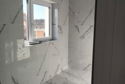 Casă cu 4 camere cu Teren 122 Mp în Central - 2